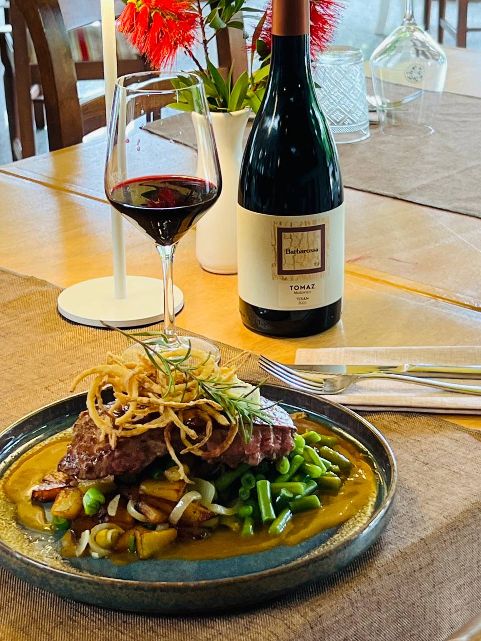 Meat main course with wine